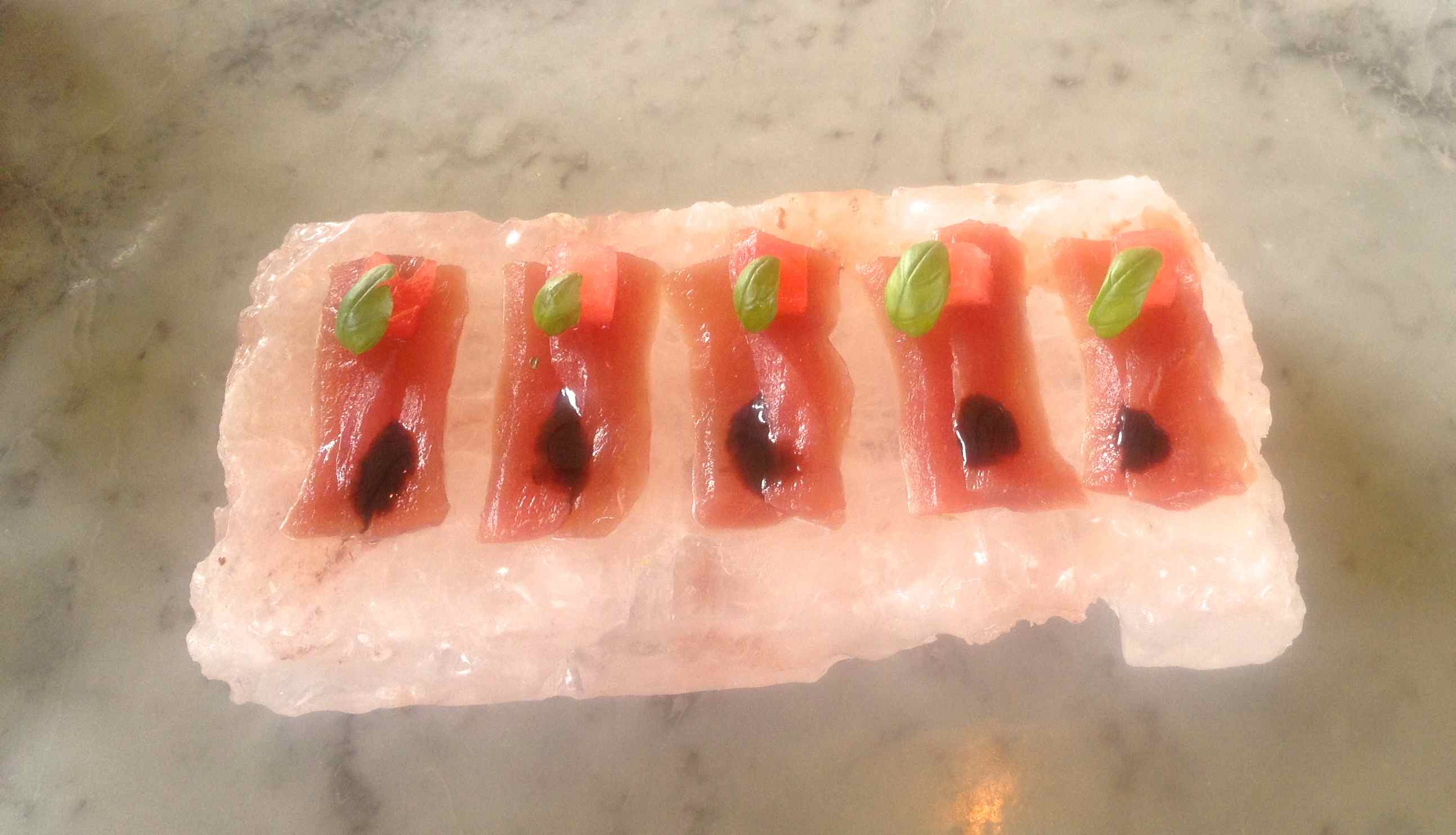 Fresh seafood - Tuna sashimi with watermelon and basil.